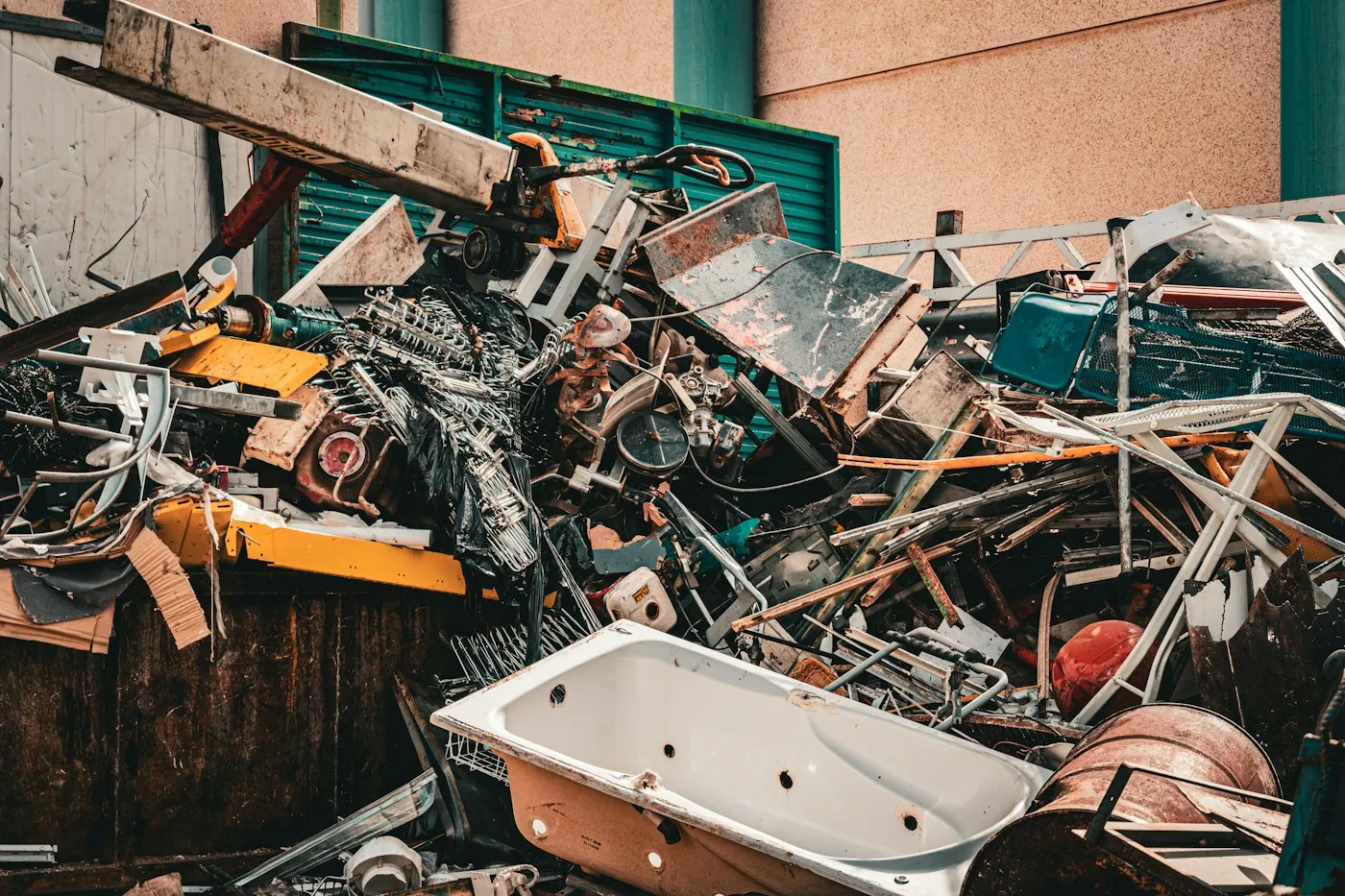 Household scrap metal including an old bath awaiting collection Stevenage Scrap Metal Ltd Hertfordshire